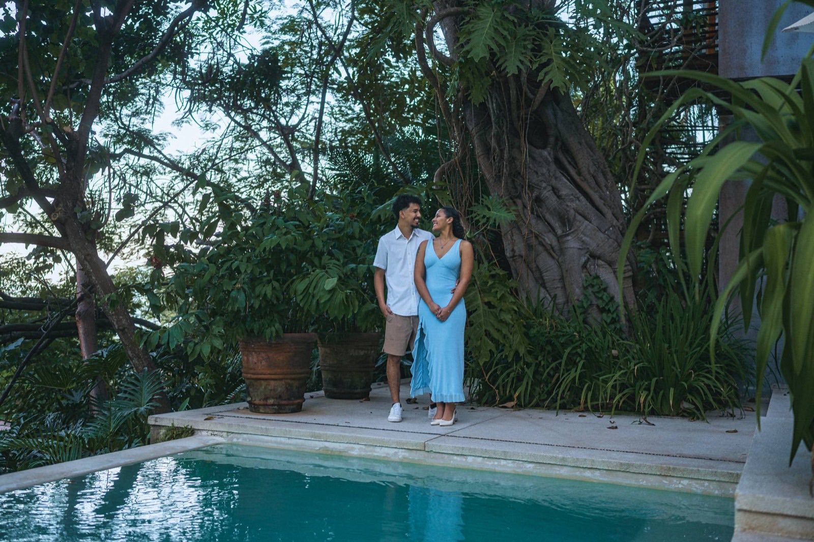 Couple photoshoot by the pool at a tropical villa in Puerto Vallarta